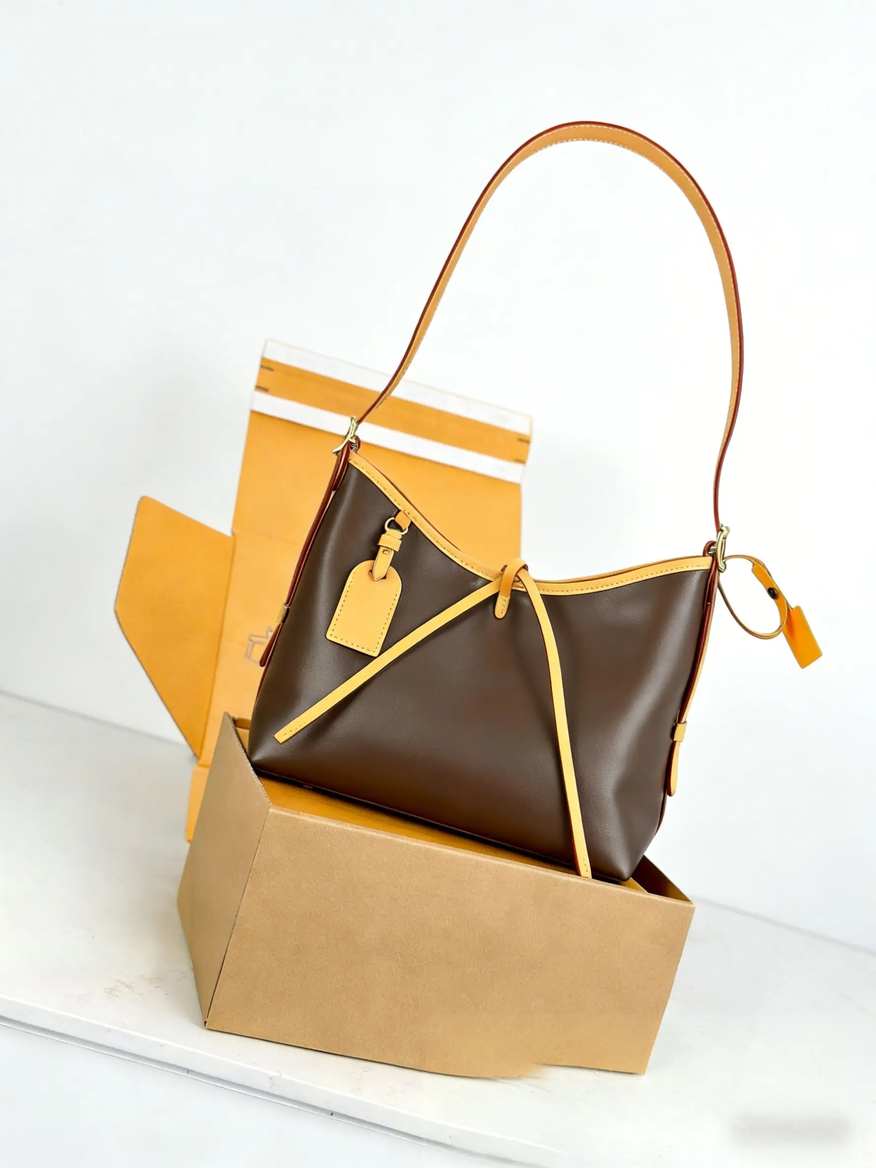 

2025 New Retro Two-Tone Hobo Bag Women Large Capacity Leather Shoulder Underarm Bag Brand Bag.