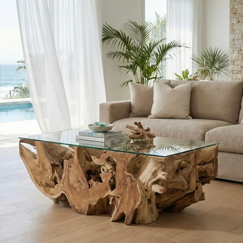 The hand-crafted teak root coffee table is a unique natural decoration in the living room, featuring an environmentally friendly