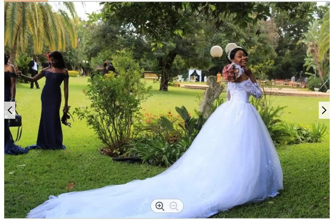 Piękne Off the Shoulder-line suknie ślubne królewski tren koronkowe aplikacje Vestido Largo Elegante długie rękawy suknie ślubne