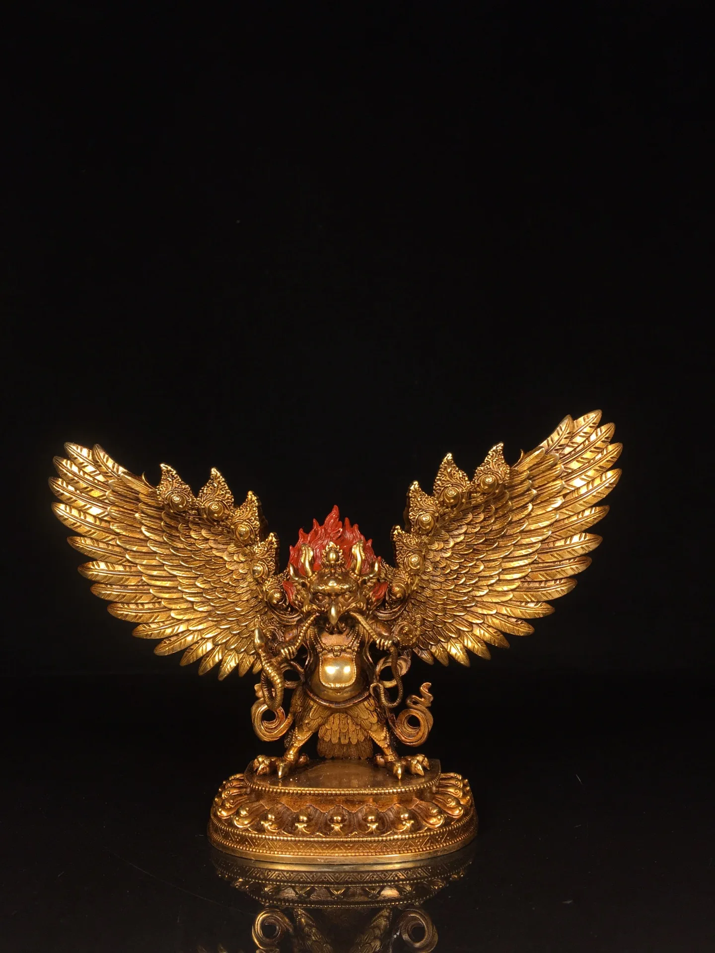 A finely crafted bronze replica of a golden-winged Garuda, gilded with gold, showing signs of age and patina.,Free shipping