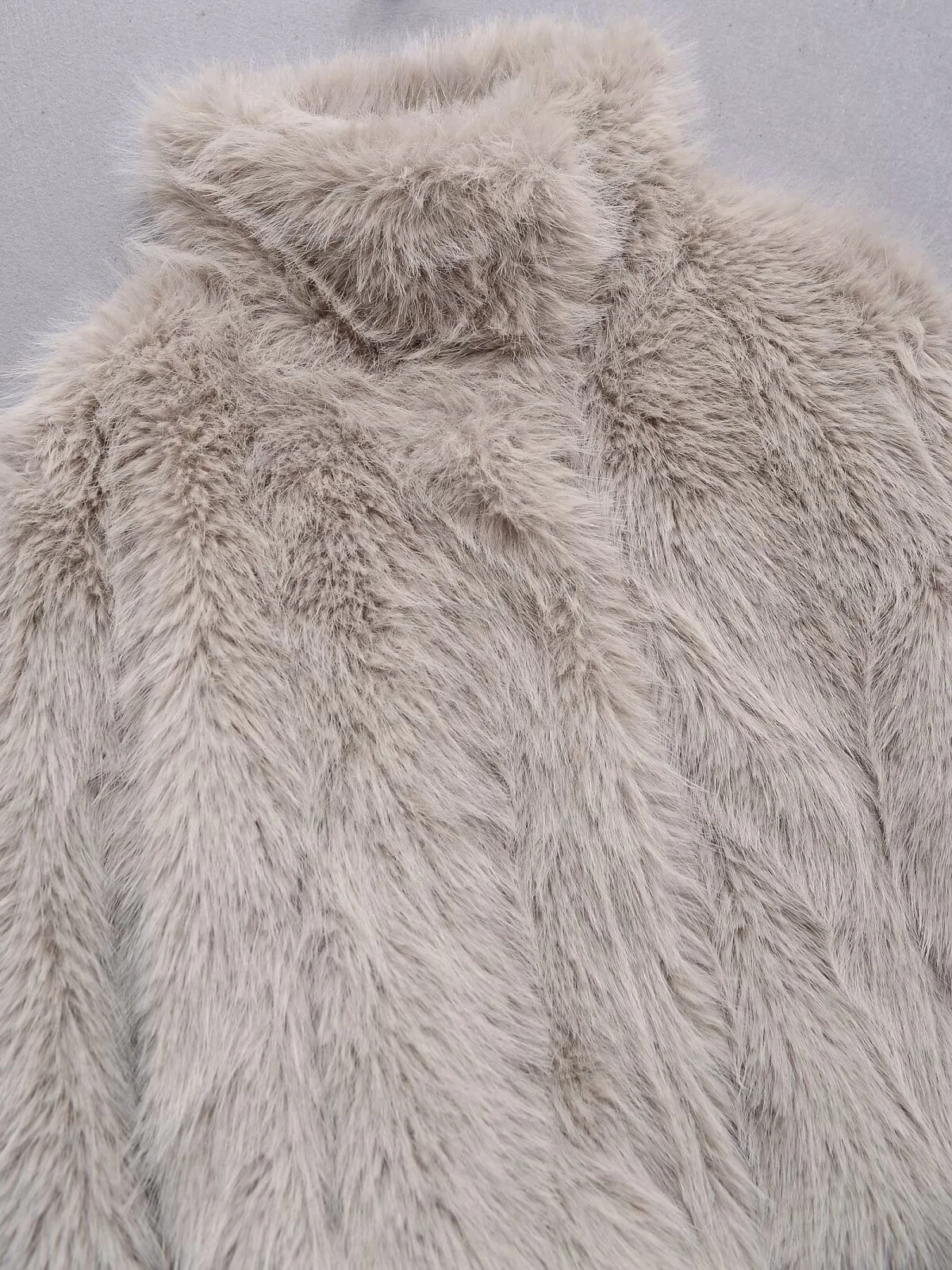 2025 invierno nueva mujer Casual moda elegante piel sintética cuello alto manga larga abrigo corto de felpa Top