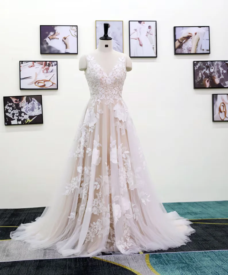 

Customized Exquisite A-Line Deep V-Neck Sheer Lace Wedding Dress 3d Lace Wedding Dress With Deep Champagne Lining And Large Tail