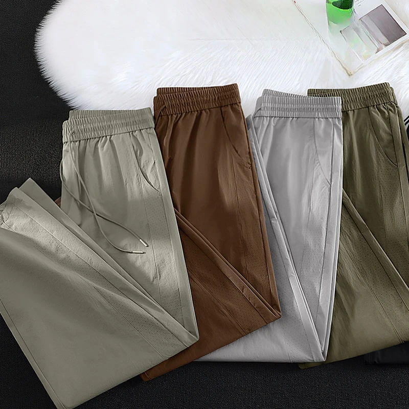 Spodnie męskie W2EJOURNEY EU US Trendy Cienkie Jednolite Kolor Siateczka Oddychające Proste Szerokie Nogawki Sportowe Casual