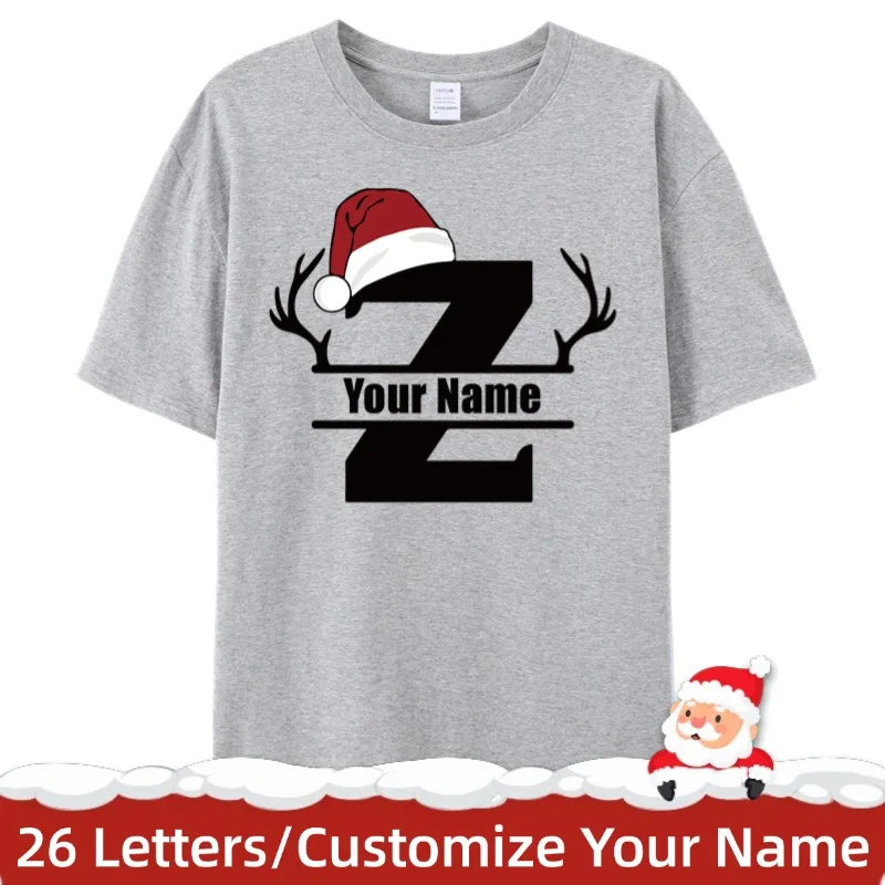 

Custom Christmas Letter T-Shirt,Personalized Name,Festive Santa Hat&Antlers,26 Letters Available,Unique Xmas Gift ,Unisex Tees