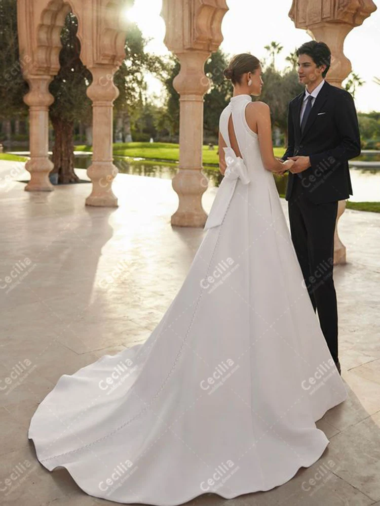 Abiti da sposa affascinanti Una linea di abiti da sposa in raso senza maniche Abiti moderni per la festa formale Abiti da sposa personalizzati 2025