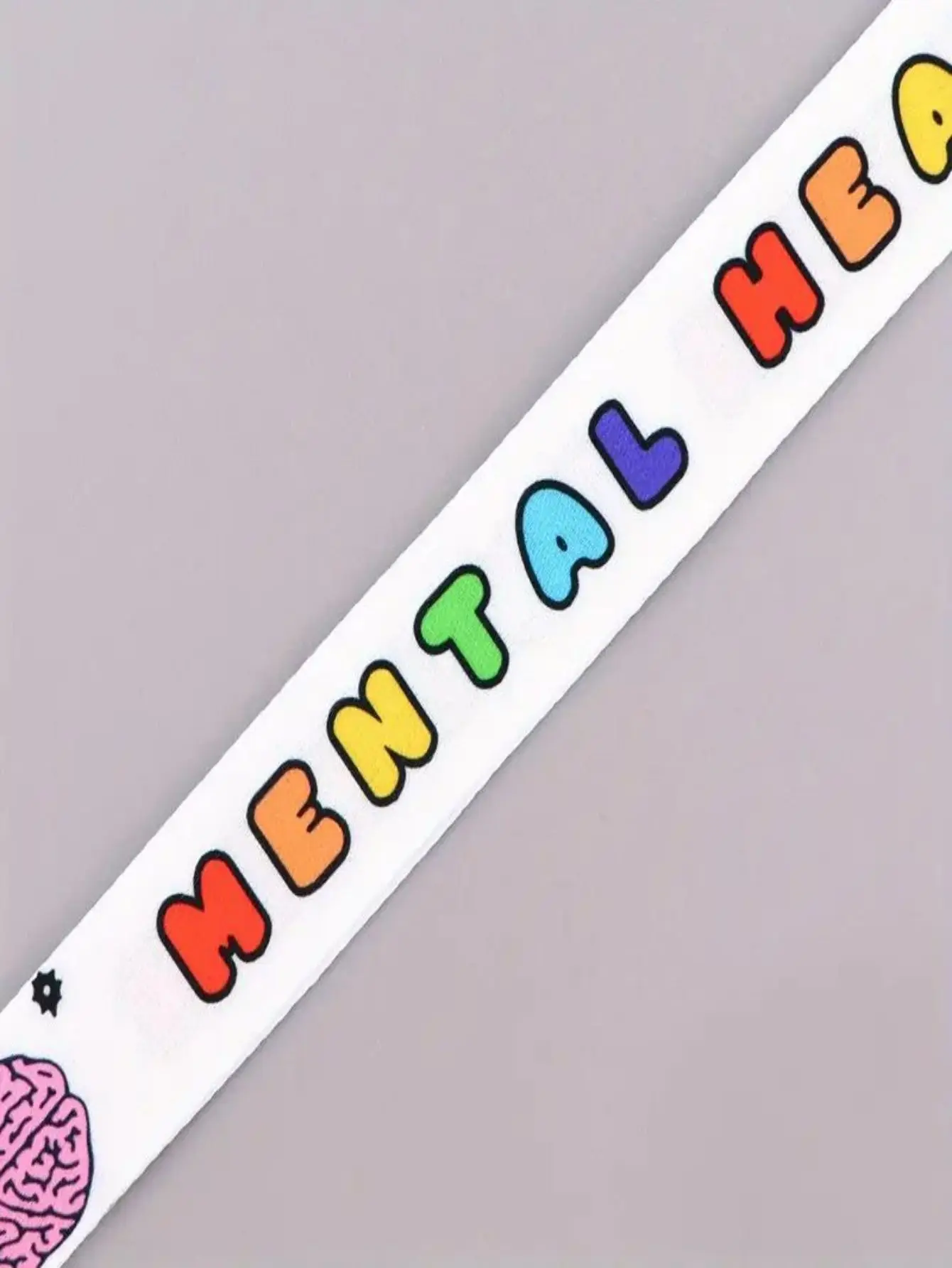 Portachiavi con cordino per la consapevolezza della salute mentale - Design colorato del cervello dei cartoni animati, con la parola "Mentale"