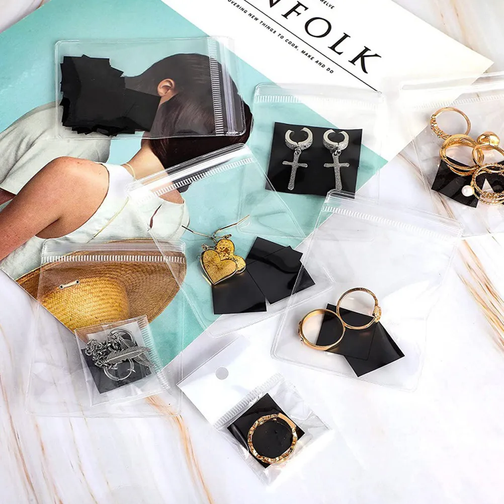 

50 комплектов прозрачных мешочков для украшений, предотвращающих потемнение, для хранения ожерелий, серег и колец, легкий портативный органайзер