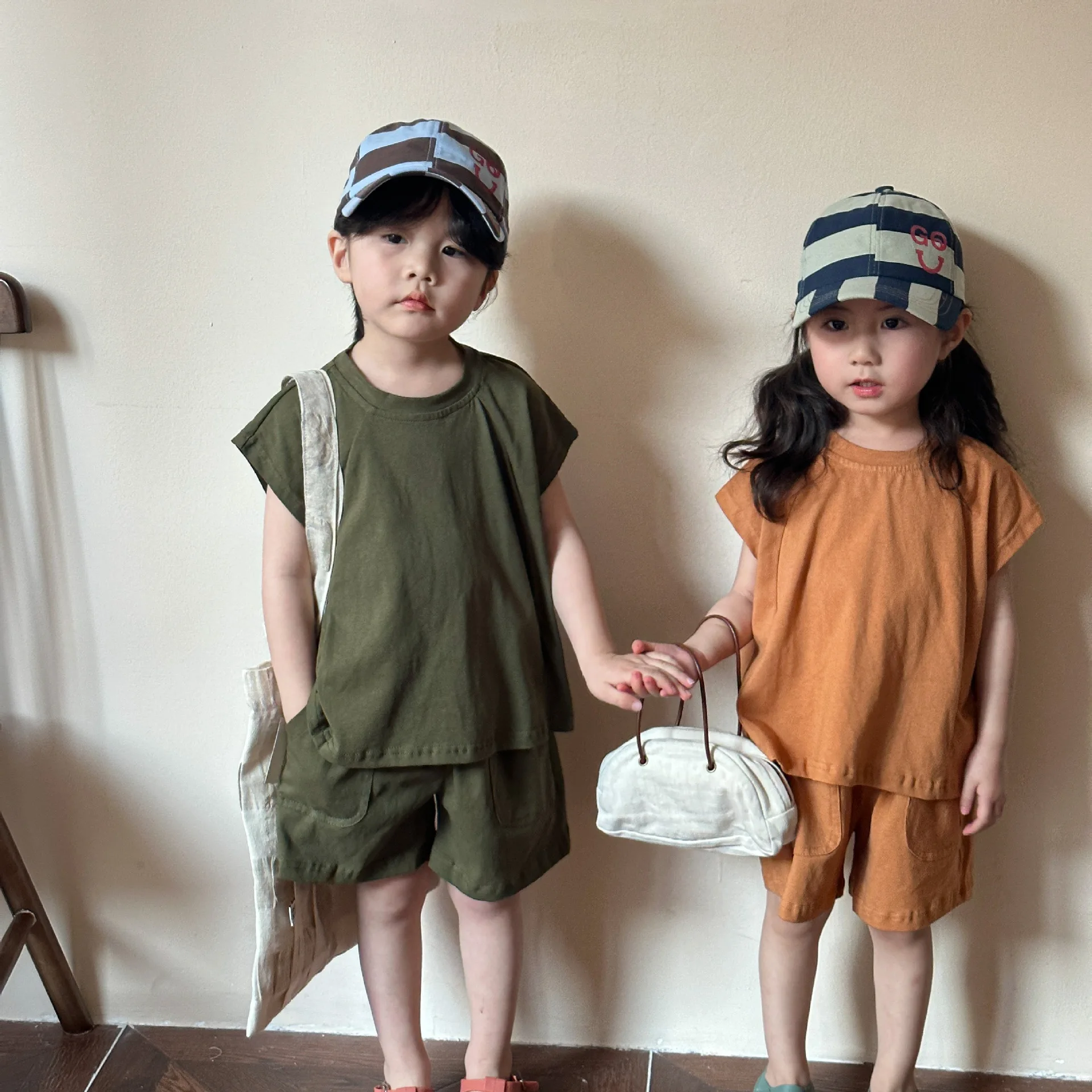 

2024 Summer New Children Sleeveless Clothes Set Boys Girls Solid Loose Sports Vest + Shorts 2pcs Suit Kids Cotton Casual Outfits