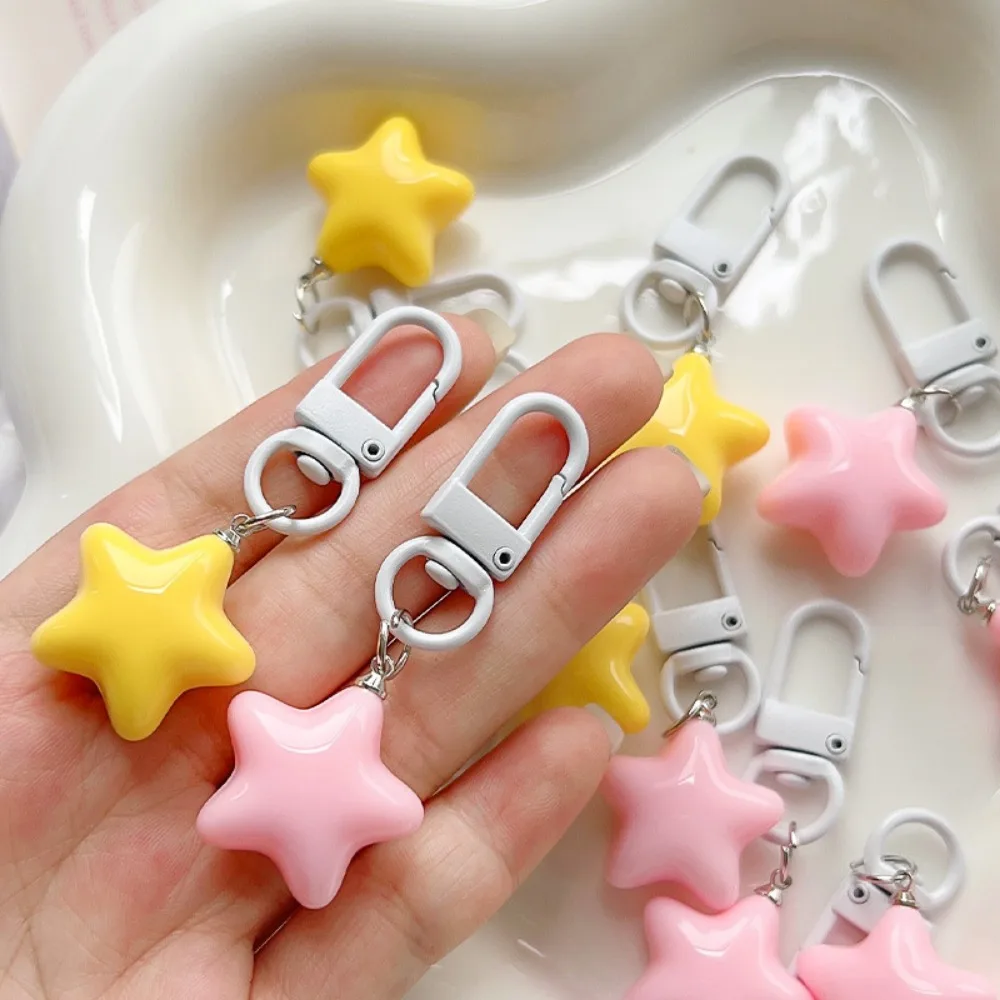 1pc bonito estrelas chaveiro para mulheres pentagrama pingente chaveiros saco da menina charme fone de ouvido caso diy acessórios casal presente