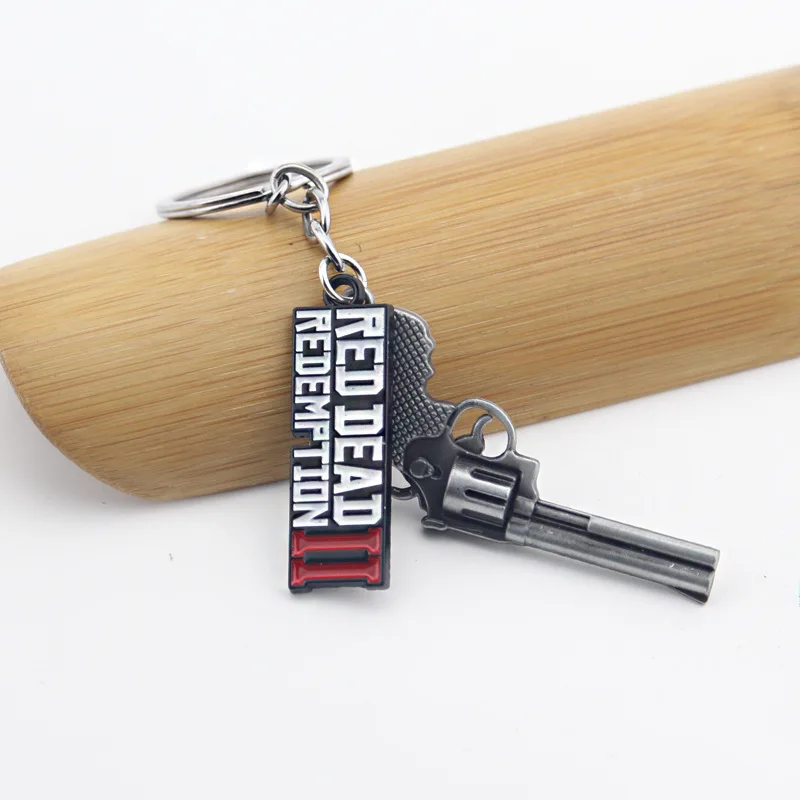 مغامرة لعبة RDR2 آرثر مورغان مسدس المفاتيح الإبداعية مسدس صغير كيرينغ ظهره سيارة قلادة مجوهرات اكسسوارات هدية