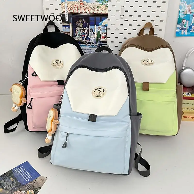 Pink Black White Color Block Nylon Backpack Cute Large Capacity Lightweight Student Travel Rucksack With Toast Doll Pendant