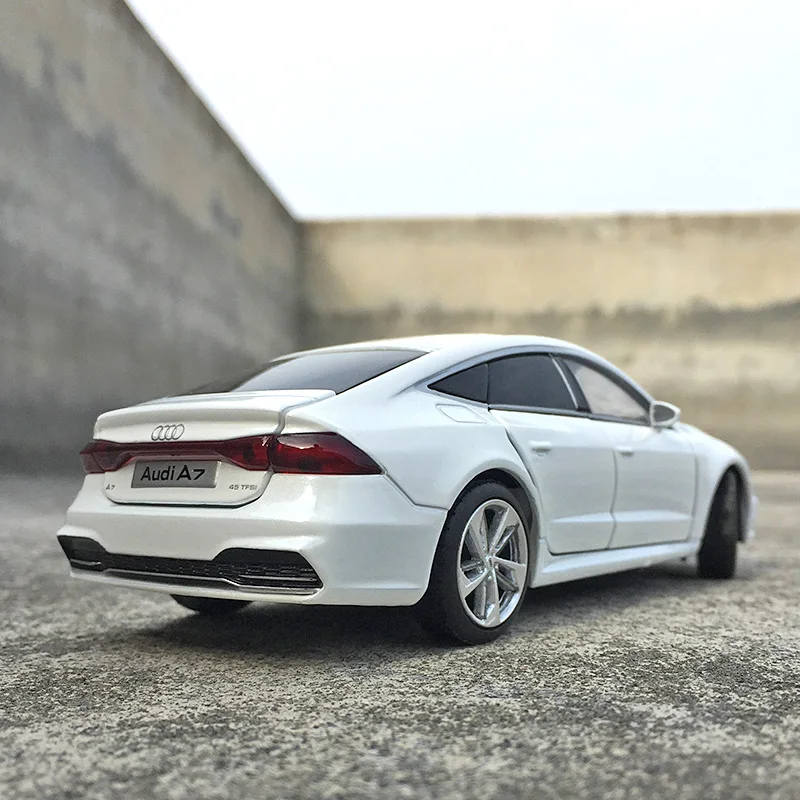 รถ1:32 Audi A7 Coupe อัลลอยด์โมเดลรถของเล่นและยานพาหนะของเล่นรถของเล่นโลหะโมเดลรถยนต์ของเล่นจำลองสำหรับเด็ก