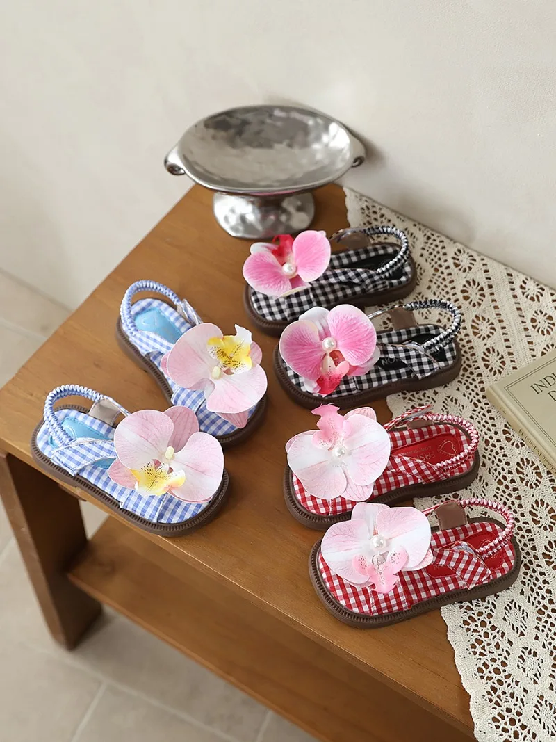 

Kids Girls Gingham Sandals with Orchid Flower, Soft Non-slip Sole, Cute Elastic Back Strap for Summer, Beach & Casual Wear