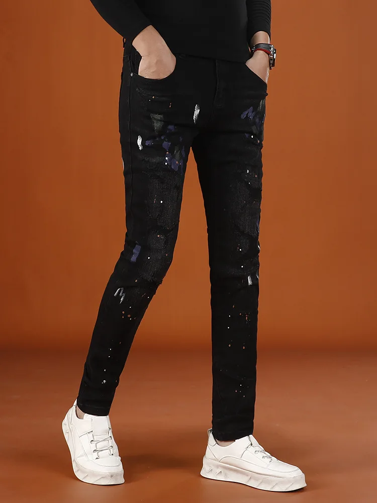 

Paint printed ripped jeans men's 2025 autumn new item elastic small foot trendy street handsome men's pants