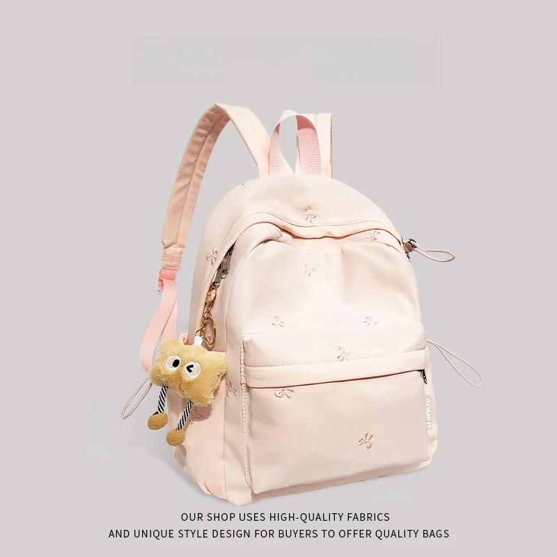 حقيبة مدرسية وردية اللون للفتيات جديدة 2025 المدرسة الثانوية بابا طبقة مزدوجة البوليستر المواد الداخلية سستة إغلاق استخدام الحرم الجامعي