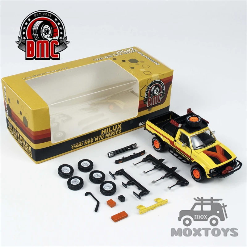 

BM Creations 1:64 1980 Hilux N60, N70 -Yellow w/Accessory (RHD) Diecast Model Car