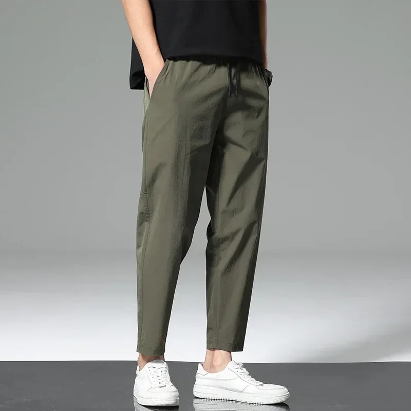 

Spring and Summer Men's Thin Senior Ice Silk Breathable Casual Pants Loose Quick Drying Men's Pants Sports Nine-point Pants Men