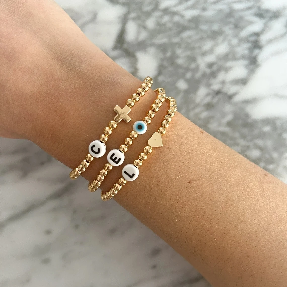 

Vlen Customize Initial Letter Bracelet for Women Jewelry Cross Heart Evil Eye Bracelet Gold Plated 18 K Beads Stretchy Pulseras