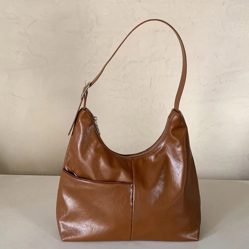 

Luxury Designer Women's Leather Handbag High End Bag 2026 Retro Hobos Shoulder Purse Bolsas Femininas University Bag Woman