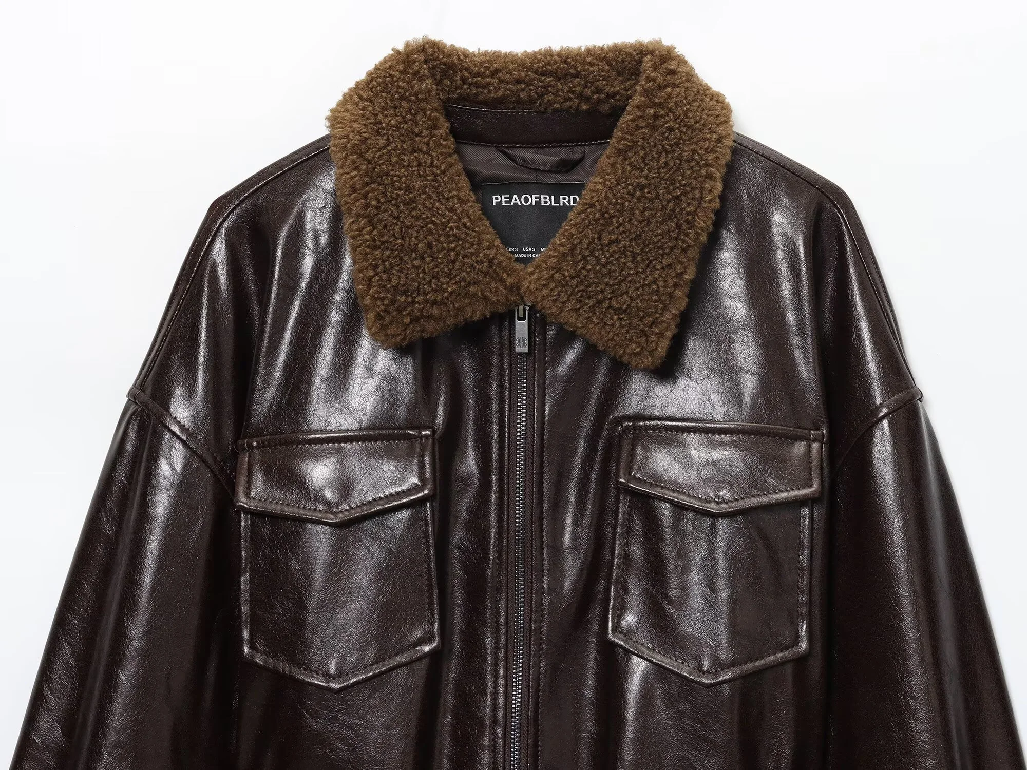 شتاء جديد المرأة الفرنسية أضعاف طوق سحاب أكمام طويلة الديكور المغلفة مشبك سترة معطف