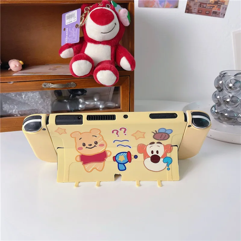 حافظة مفاتيح ديزني ويني ذا بوه لعلبة مفاتيح واقية مكونة من وحدة تحكم نينتندو سويتش NS ملحقات وحدة تحكم من البولي يوريثان الحراري