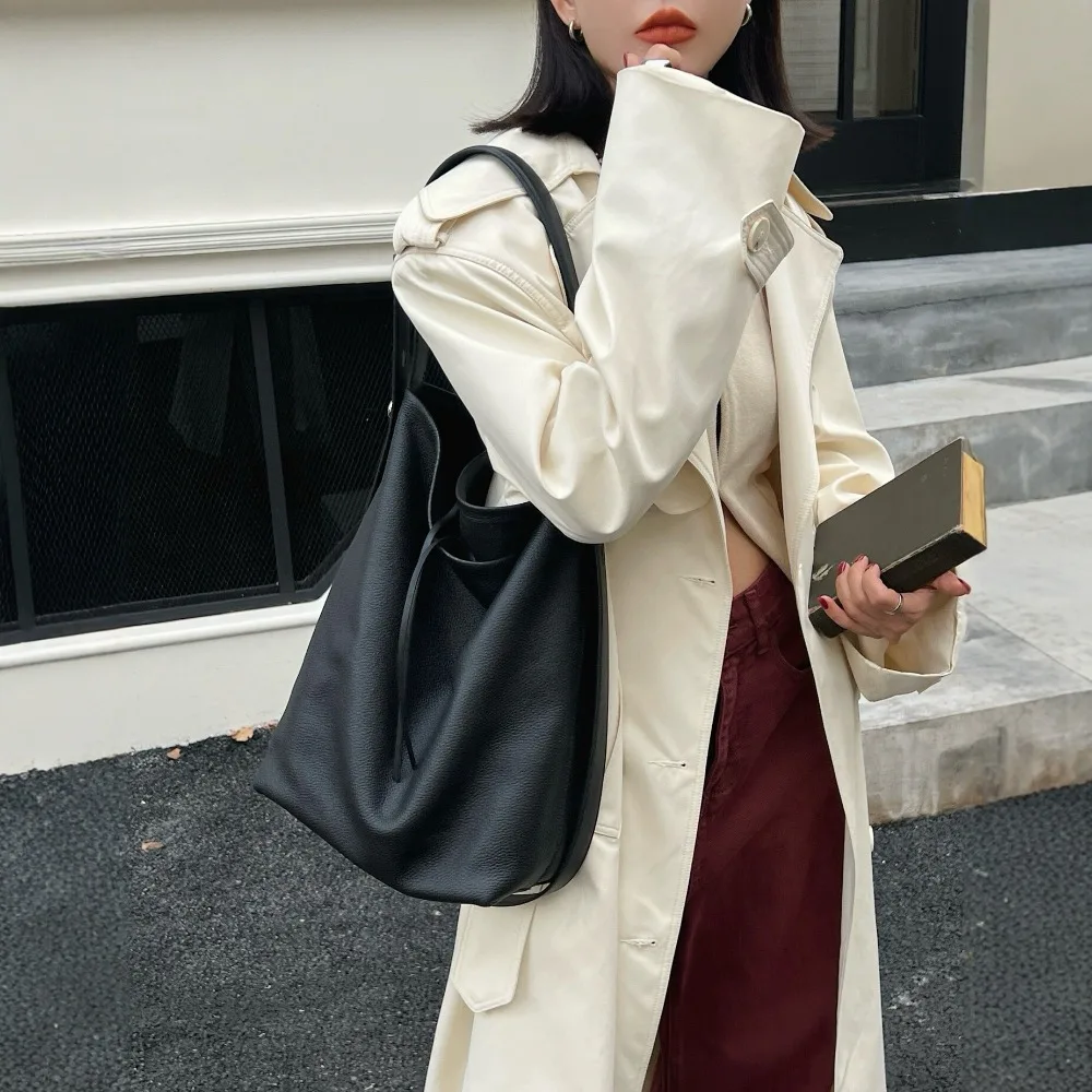 2026 New Bucket Bag Women's Simple and Versatile Commuter Shoulder Messenger Exquisite Texture Unique Premium High Sense