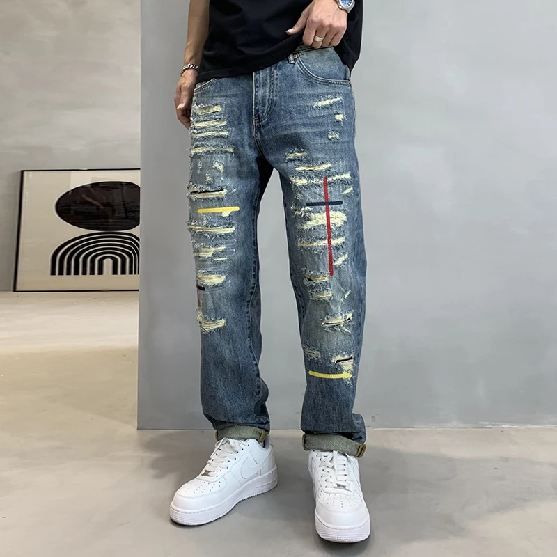 

2024 new biker personality red line cut holes retro blue jeans men's gangster handsome loose with micro-tapered pants