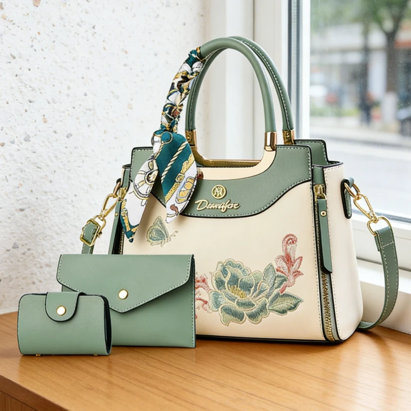 3-piece embroidered handbag set including a matching clutch and card holder, decorated with an exquisite pendant