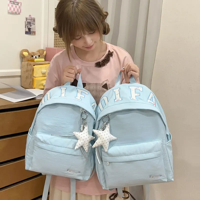 Korean-style student backpack, versatile vintage embroidered letter backpack for high schoolinsJapanese-style junior high school