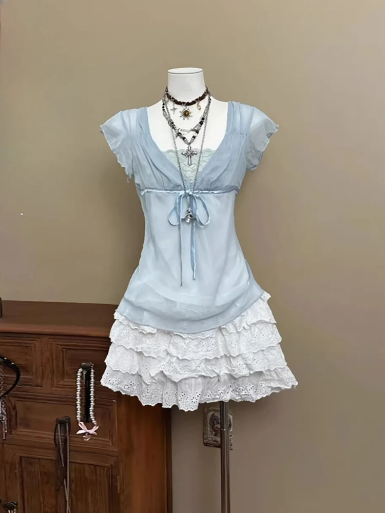 

Новинка: Летний винтажный комплект из двух предметов для женщин: топ с кружевными вставками и имитацией двухслойности, милая многослойная мини-юбка с высокой талией.