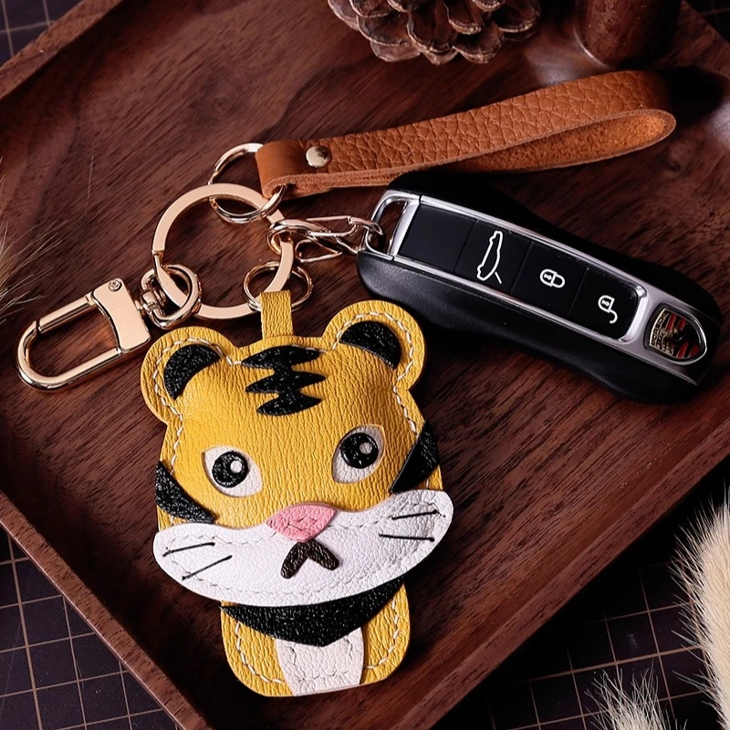 

Подвеска в виде тигра, подвеска из французской овчины, сумка-подвеска для телефона, брелок из натуральной кожи ручной работы.