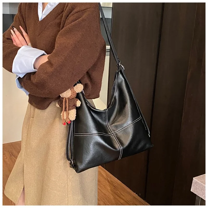 

Trendy Women's Soft Oversized Crossbody Bag with Contrast Stitching for Daily Commute, Errands and Weekend Activities Hand Bags