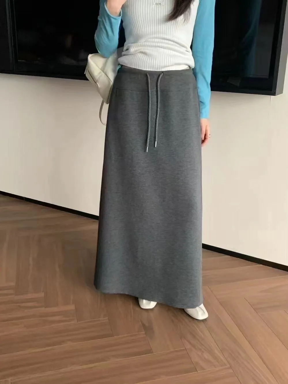 أوائل الخريف 2025 المرأة عالية الخصر مستقيم قطع تنورة الكورية Sle Dstring با سبليت عادية التخسيس تنورة طويلة