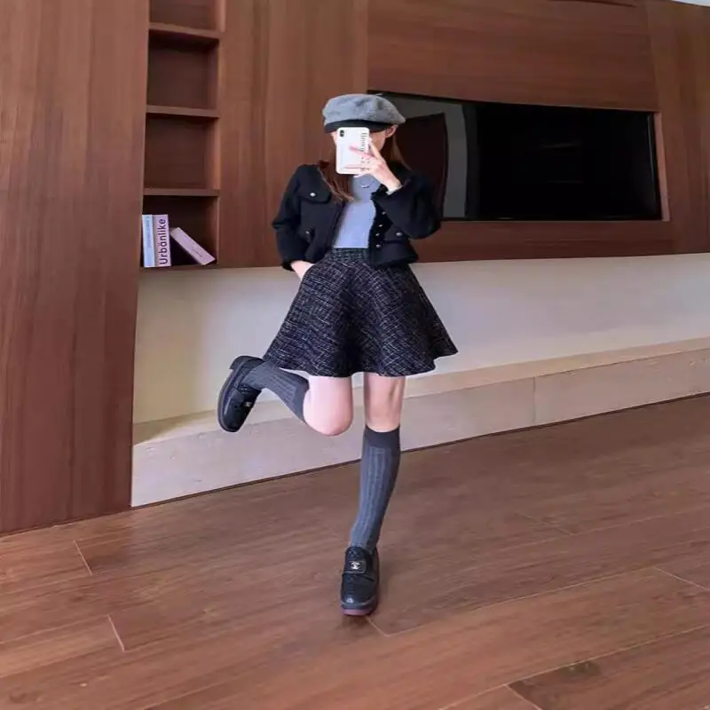 Geruite rok Dames Hoge taille Minimalistisch Modieus Kantoorkleding Veelzijdige rok Broek Herfst Winter Korte rok Leuke nieuwe stijl