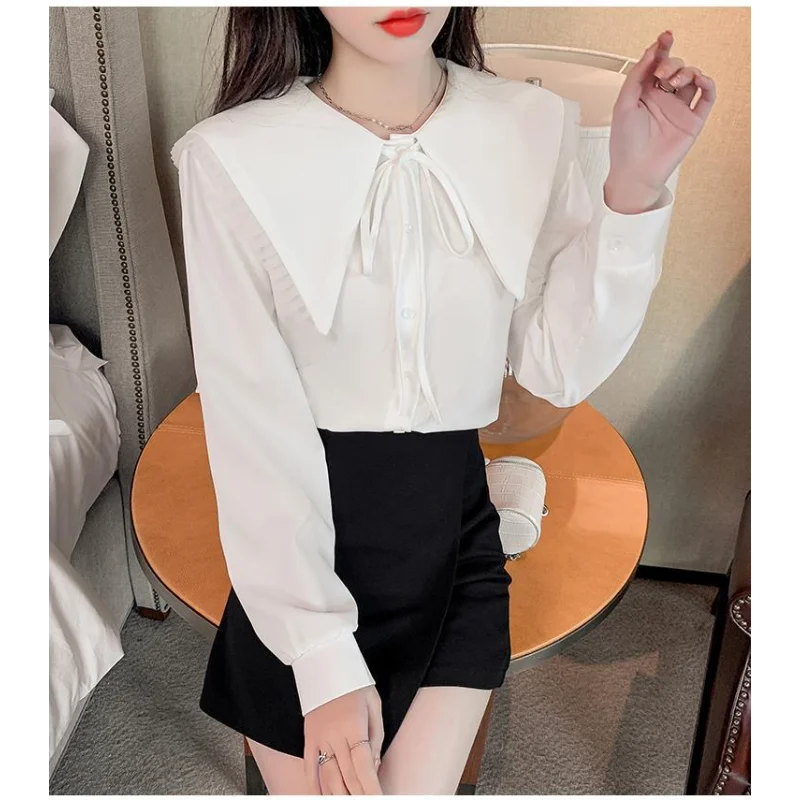 Camicia francese con colletto a bambola dolce per donna Top in chiffon a maniche lunghe stile nuovo design primaverile