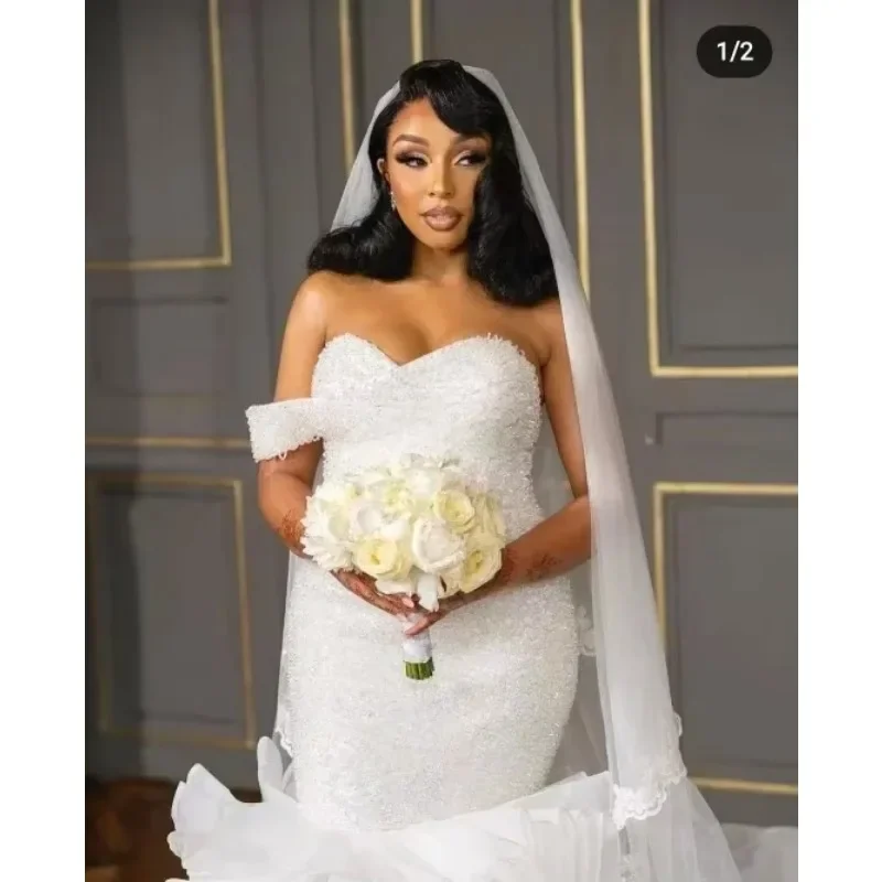 맞춤형 스위트하트 반짝이는 헤비 비즈 스팽글 머메이드 웨딩 드레스 베스티도 데 카사멘토 오간자 캐스케이딩 러플 브라이덜 가운