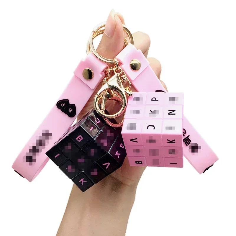 Cute black and pink Mini Rubik's Cube Keychain Pendant Wholesale Cartoon Book Bag Pendant Small Jewelry Keychain