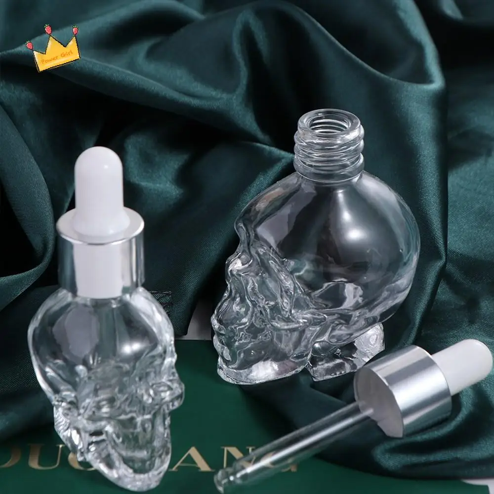 

Fashion Glass Dropper Skull Shape Bottle with Pipette Transparent Glass Liquid Dropper Bottle Empty Creative Travel