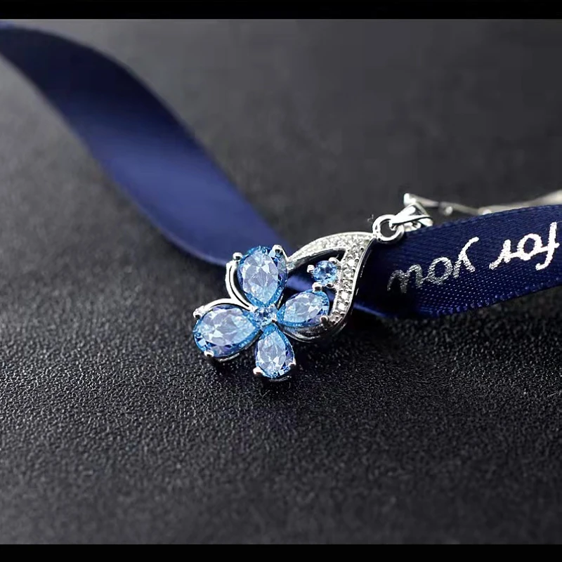 Fashion clover blue pendant aquamarine artificial gemstone necklace Europe and the United States retro lucky gift necklace