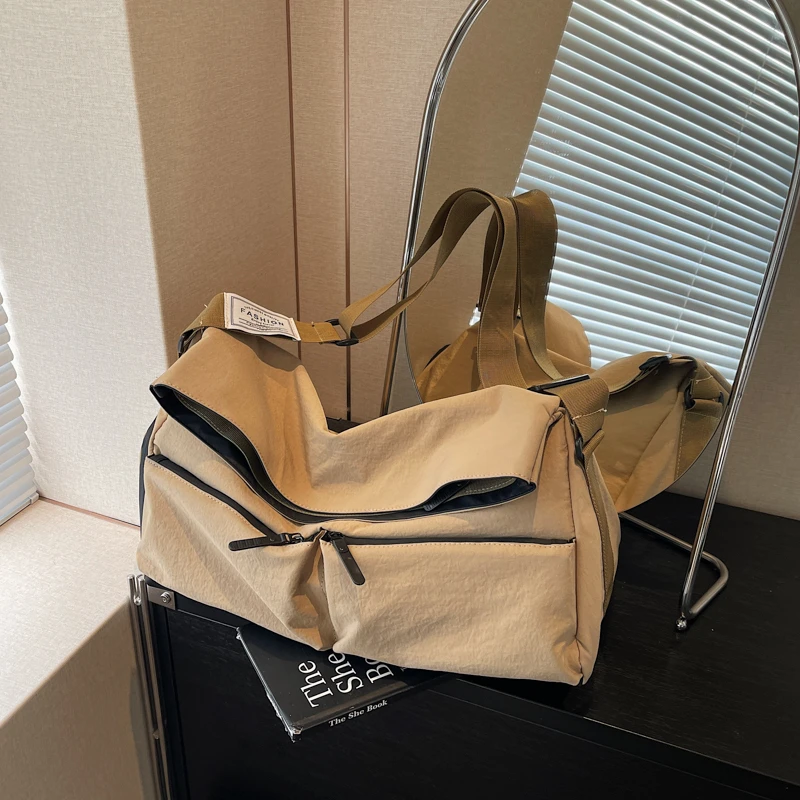 

Oxford Zipper Solid Color Travel Duffels Simple Large Capacity Bags Female 2025 Fashion Multifunctional Portable Travel Bags