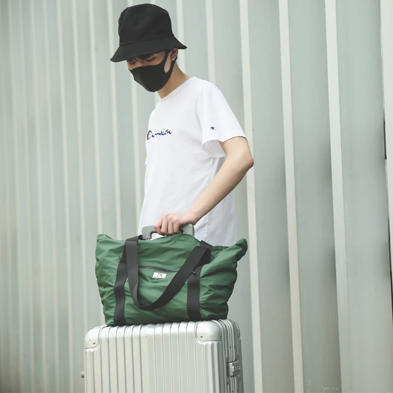 Borsa da viaggio portatile leggera Custodia impermeabile Borsa a tracolla adatta sia per uomini che per donne
