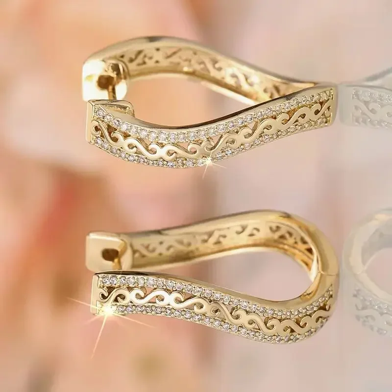 Pendientes de mujer con forma de S, microincrustaciones huecas irregulares, accesorio de moda europeo-americano de nicho, tapones para las orejas.