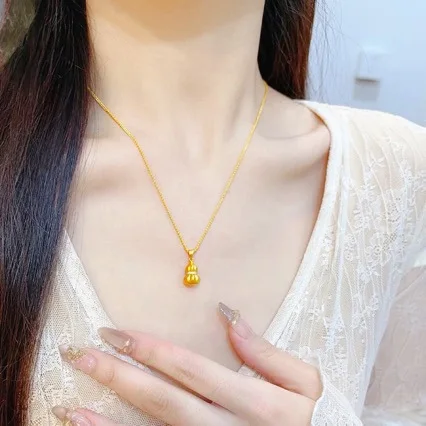 

Women's 24K Gold AU999 Crystal-Inset Solid Gourd Pendant | Titanium-edged with glow-in-the-dark accents, adventurous style