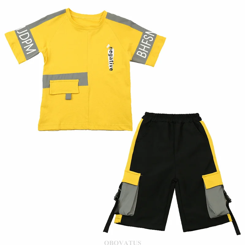 Nieuwe zomer kinderjongenskledingsets mode reflecterende outfits katoenen T-shirt + shorts sportpak tienerkind casual trainingspak