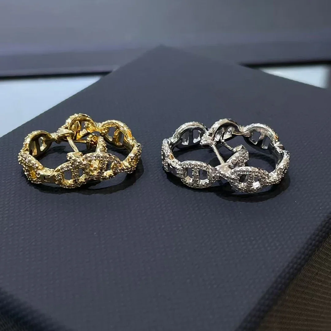 

Hot selling hollowed out full diamond classic style S 925 sterling silver women's earrings are non allergenic and non fading.