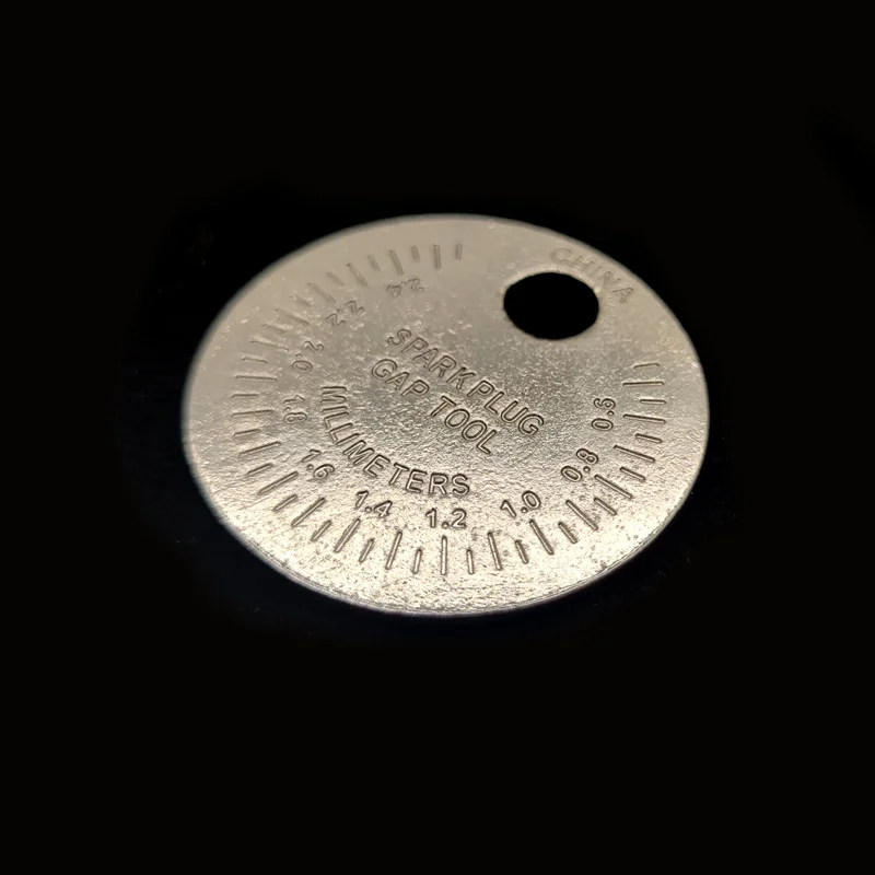 Herramienta de medición de espacio de bujía, tipo moneda, rango de 0,6-2,4mm, herramienta de espacio de calibre de bujía, 1 ud.