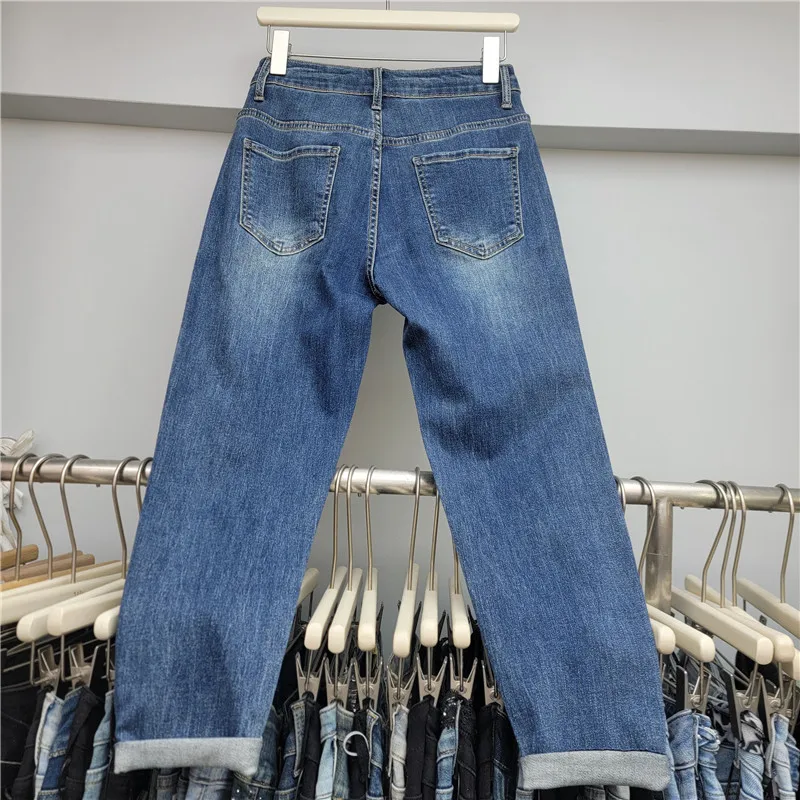2025 Autunno Nuovo Fiore Cavo Design Papà Pantaloni Elastico Hot Diamond Nove Punti Moda Blu Jeans Donna Allentato Harlan Bottoms