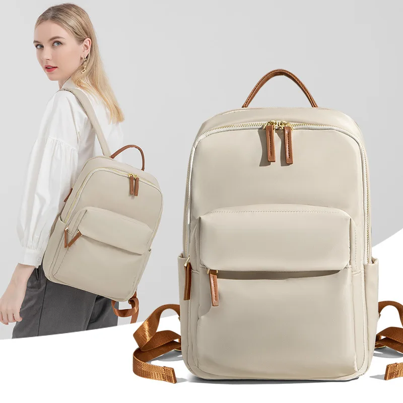 Korean version casual commuting computer backpack for women, versatile for spring and summer 2024, simple Oxford cloth travel ba