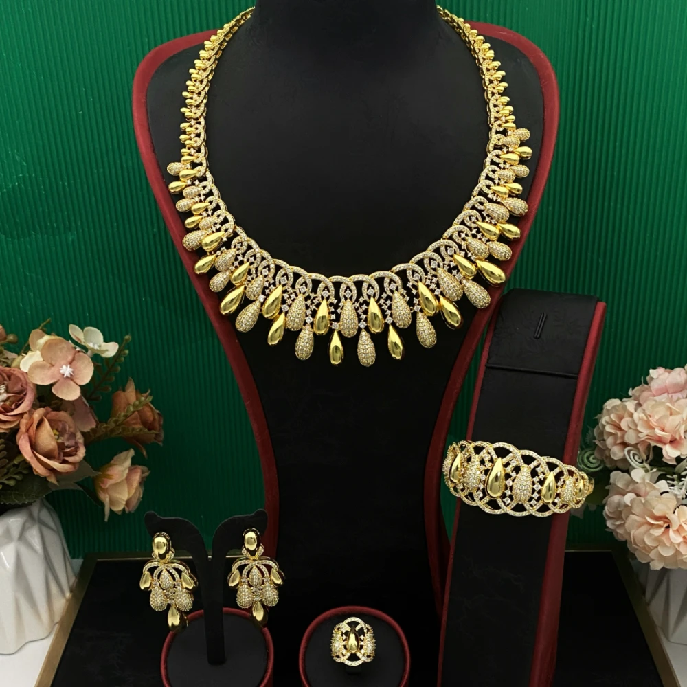 

Комплект ювелирных изделий серии Falair Bride, позолоченная медь, имитация циркония, капли воды, в комплект входят серьги, ожерелье, браслет, кольцо