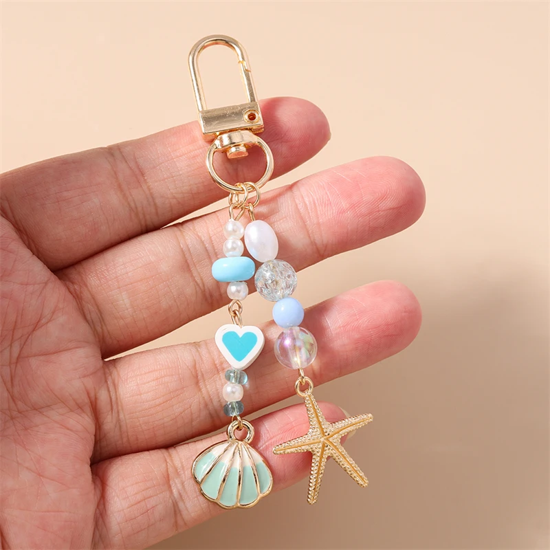Niedliche handgefertigte Perlen-Schlüsselanhänger, Sommer-Strand-Sternfisch-Muschel-Anhänger, Schlüsselringe für Damen und Herren, Autoschlüssel, Handtaschen-Schlüsselanhänger, DIY-Geschenke – Detail 2